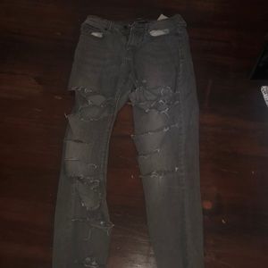 Ripped mid low rise jeans.